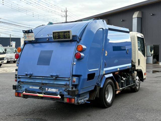 エルフトラック パッカー車　４．２立米　極東開発製プレス式パッカー　最大積載量２０００ｋｇ　左スライドドア　汚水タンク　ＬＥＤ電光掲示板　６速マニュアル（25枚目）