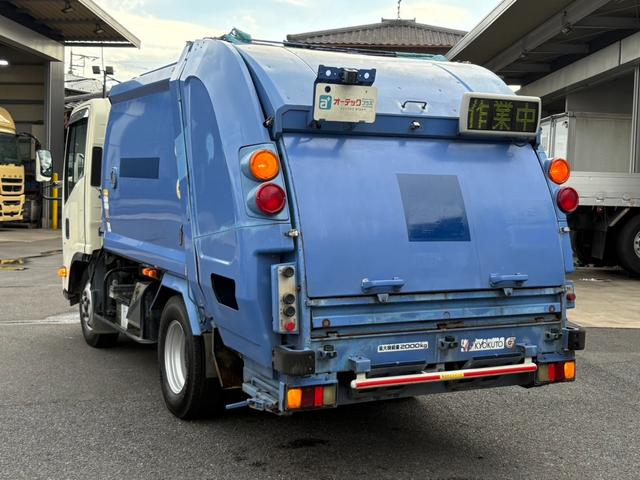 エルフトラック パッカー車　４．２立米　極東開発製プレス式パッカー　最大積載量２０００ｋｇ　左スライドドア　汚水タンク　ＬＥＤ電光掲示板　６速マニュアル（27枚目）