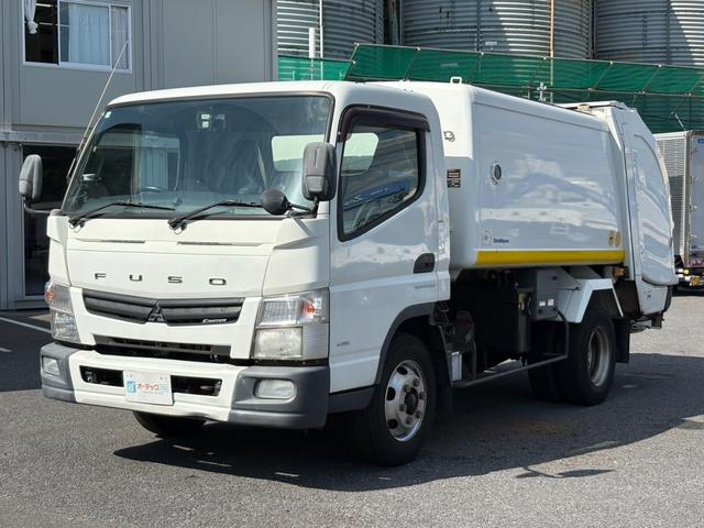 キャンター パッカー車　６．５立米　新明和製ボデー　巻き込み式パッカー　連続スイッチ　最大積載量３３００ｋｇ　汚水タンク　デュオニック２ペダル（ＡＴ限定運転可）（32枚目）