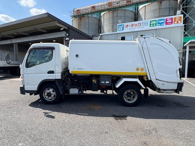 キャンター パッカー車　６．５立米　新明和製ボデー　巻き込み式パッカー　連続スイッチ　最大積載量３３００ｋｇ　汚水タンク　デュオニック２ペダル（ＡＴ限定運転可）（38枚目）