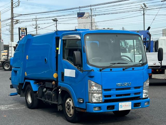 エルフトラック パッカー車 モリタ製プレスパッカー 4.1立米 最大積載量2000kg 汚水タンク 6速マニュアル 左スライドドア 左電動格納ミラー キャビン内書類棚 4JJ1エンジン150馬力(4枚目)