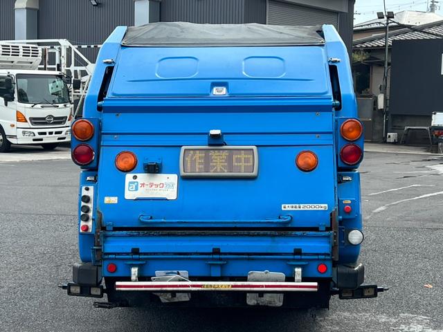 エルフトラック パッカー車 モリタ製プレスパッカー 4.1立米 最大積載量2000kg 汚水タンク 6速マニュアル 左スライドドア 左電動格納ミラー キャビン内書類棚 4JJ1エンジン150馬力(8枚目)