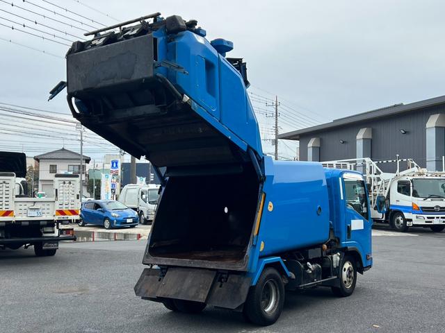 エルフトラック パッカー車 モリタ製プレスパッカー 4.1立米 最大積載量2000kg 汚水タンク 6速マニュアル 左スライドドア 左電動格納ミラー キャビン内書類棚 4JJ1エンジン150馬力(12枚目)