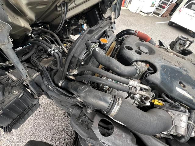 エルフトラック パッカー車 モリタ製プレスパッカー 4.1立米 最大積載量2000kg 汚水タンク 6速マニュアル 左スライドドア 左電動格納ミラー キャビン内書類棚 4JJ1エンジン150馬力(35枚目)