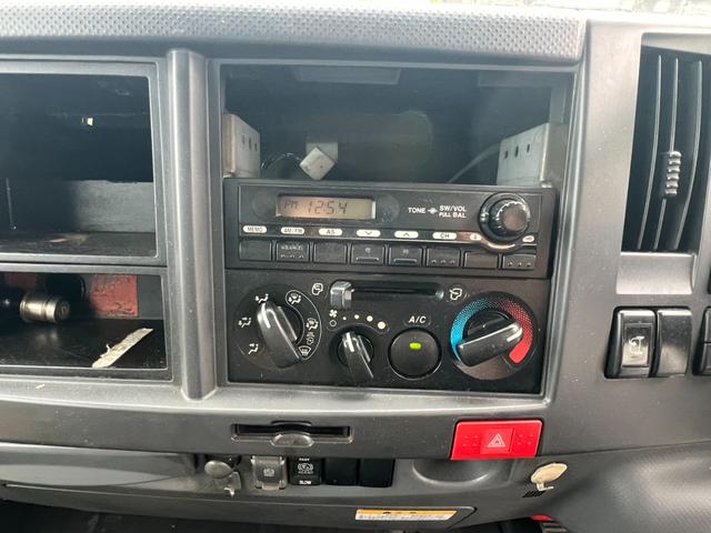 エルフトラック パッカー車 モリタ製プレスパッカー 4.1立米 最大積載量2000kg 汚水タンク 6速マニュアル 左スライドドア 左電動格納ミラー キャビン内書類棚 4JJ1エンジン150馬力(44枚目)