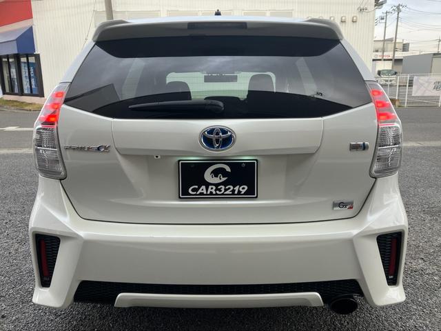 プリウスアルファ Sツーリングセレクション・G’s アルパイン9インチビックXナビ フリップダウンモニター 社外シーケンシャルミラー G’s専用ハーフレザーシート G’s18インチAW スマートキー 社外レーダー(4枚目)