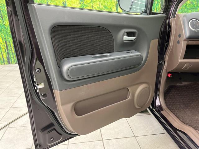 E ショコラティエ 純正ナビ 禁煙車 Bluetooth再生 スマートキー オートライト オートエアコン DVD再生 CD再生 地デジ 盗難防止装置 プライバシーガラス シートリフター トラクションコントロール(27枚目)