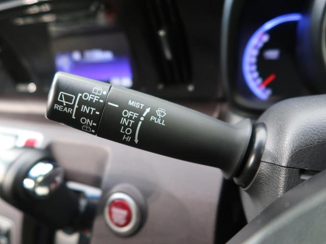 プレミアム・Lパッケージ 純正ディスプレイオーディオ 禁煙車 バックカメラ Bluetooth再生 ETC HIDヘッド オートライト スマートキー 革巻きステアリング 純正14AW CD再生 衝突安全ボディ 盗難防止装置(22枚目)
