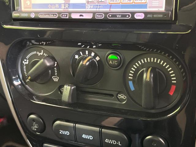 ジムニー ランドベンチャー　４ＷＤ　ＭＴ車　ＳＤナビ　禁煙車　ハーフレザーシート　シートヒーター　ドラレコ　スマートキー　ＥＴＣ　純正１６インチＡＷ　電動格納ミラー　ドアバイザー　プライバシーガラス　盗難防止システム（7枚目）