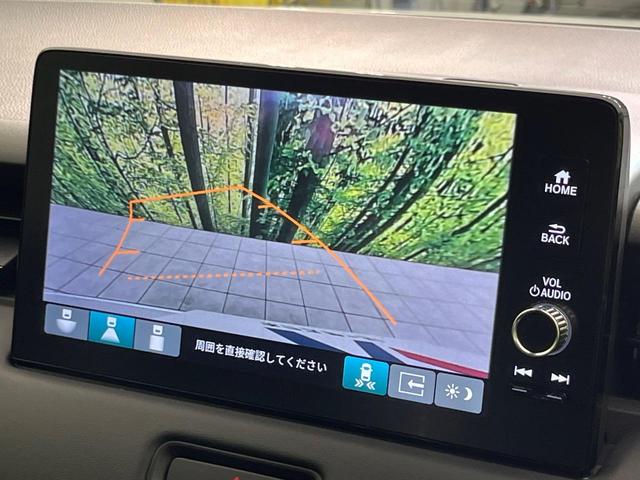 ヴェゼル ｅ：ＨＥＶ　Ｚ　登録済未使用車　純正９型ナビ　バックカメラ　ホンダセンシング　禁煙車　ＥＴＣ　Ｂｌｕｅｔｏｏｔｈ接続　シートヒーター　パワーバックドア　ハーフレザーシート　ＬＥＤヘッドライト　置くだけ充電（4枚目）