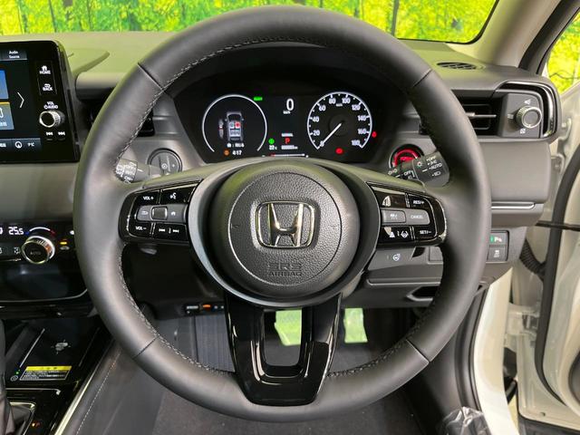 ヴェゼル ｅ：ＨＥＶ　Ｚ　登録済未使用車　純正９型ナビ　バックカメラ　ホンダセンシング　禁煙車　ＥＴＣ　Ｂｌｕｅｔｏｏｔｈ接続　シートヒーター　パワーバックドア　ハーフレザーシート　ＬＥＤヘッドライト　置くだけ充電（11枚目）