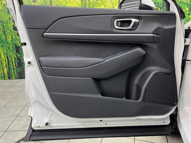 ヴェゼル ｅ：ＨＥＶ　Ｚ　登録済未使用車　純正９型ナビ　バックカメラ　ホンダセンシング　禁煙車　ＥＴＣ　Ｂｌｕｅｔｏｏｔｈ接続　シートヒーター　パワーバックドア　ハーフレザーシート　ＬＥＤヘッドライト　置くだけ充電（36枚目）