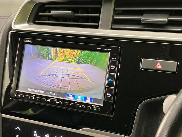 フィットハイブリッド L ホンダセンシング 純正ナビ バックカメラ 寒冷地仕様 ホンダセンシング レーダークルーズ 禁煙車 ハーフレザーシート コーナーセンサー デジタルインナーミラー LEDヘッド&フォグ ETC Bluetooth再生(4枚目)