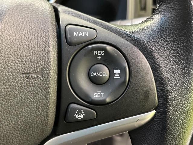 フィットハイブリッド L ホンダセンシング 純正ナビ バックカメラ 寒冷地仕様 ホンダセンシング レーダークルーズ 禁煙車 ハーフレザーシート コーナーセンサー デジタルインナーミラー LEDヘッド&フォグ ETC Bluetooth再生(6枚目)