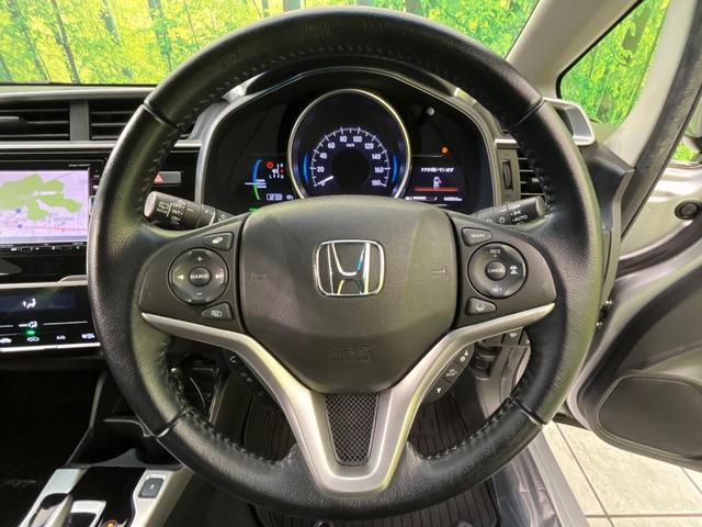 フィットハイブリッド L ホンダセンシング 純正ナビ バックカメラ 寒冷地仕様 ホンダセンシング レーダークルーズ 禁煙車 ハーフレザーシート コーナーセンサー デジタルインナーミラー LEDヘッド&フォグ ETC Bluetooth再生(11枚目)
