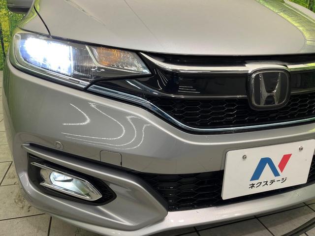 フィットハイブリッド L ホンダセンシング 純正ナビ バックカメラ 寒冷地仕様 ホンダセンシング レーダークルーズ 禁煙車 ハーフレザーシート コーナーセンサー デジタルインナーミラー LEDヘッド&フォグ ETC Bluetooth再生(12枚目)