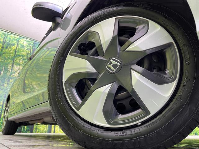 フィットハイブリッド L ホンダセンシング 純正ナビ バックカメラ 寒冷地仕様 ホンダセンシング レーダークルーズ 禁煙車 ハーフレザーシート コーナーセンサー デジタルインナーミラー LEDヘッド&フォグ ETC Bluetooth再生(13枚目)