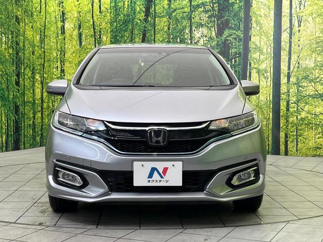 フィットハイブリッド L ホンダセンシング 純正ナビ バックカメラ 寒冷地仕様 ホンダセンシング レーダークルーズ 禁煙車 ハーフレザーシート コーナーセンサー デジタルインナーミラー LEDヘッド&フォグ ETC Bluetooth再生(14枚目)