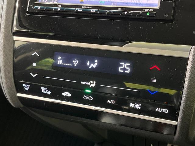 フィットハイブリッド L ホンダセンシング 純正ナビ バックカメラ 寒冷地仕様 ホンダセンシング レーダークルーズ 禁煙車 ハーフレザーシート コーナーセンサー デジタルインナーミラー LEDヘッド&フォグ ETC Bluetooth再生(27枚目)