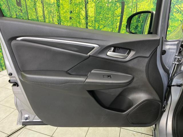 フィットハイブリッド L ホンダセンシング 純正ナビ バックカメラ 寒冷地仕様 ホンダセンシング レーダークルーズ 禁煙車 ハーフレザーシート コーナーセンサー デジタルインナーミラー LEDヘッド&フォグ ETC Bluetooth再生(34枚目)