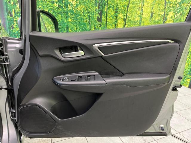 フィットハイブリッド L ホンダセンシング 純正ナビ バックカメラ 寒冷地仕様 ホンダセンシング レーダークルーズ 禁煙車 ハーフレザーシート コーナーセンサー デジタルインナーミラー LEDヘッド&フォグ ETC Bluetooth再生(35枚目)