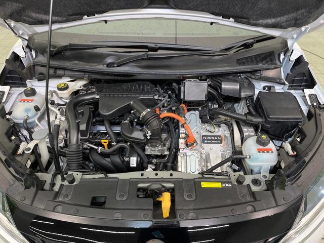 ノート X 純正9型ナビ 全周囲カメラ インテリジェントエマージェンシーブレーキ 禁煙車 置くだけ充電 ブラインドスポットモニター デジタルインナーミラー 前席シートヒーター ETC ハイビームアシスト(18枚目)