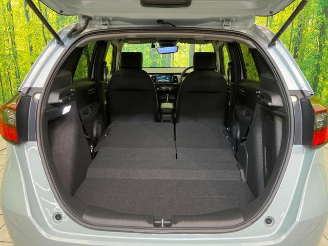 フィット e:HEVホーム 純正9型ナビ バックカメラ ホンダセンシング 禁煙車 ハーフレザーシート コーナーセンサー スマートキー LEDヘッド ETC2.0 車線逸脱警報 オートライト オートエアコン 電動格納ミラー(10枚目)