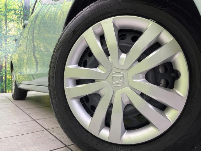 フィット e:HEVホーム 純正9型ナビ バックカメラ ホンダセンシング 禁煙車 ハーフレザーシート コーナーセンサー スマートキー LEDヘッド ETC2.0 車線逸脱警報 オートライト オートエアコン 電動格納ミラー(13枚目)