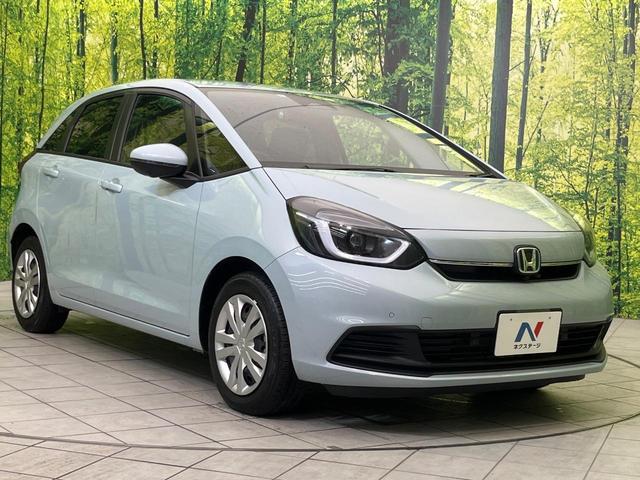 フィット e:HEVホーム 純正9型ナビ バックカメラ ホンダセンシング 禁煙車 ハーフレザーシート コーナーセンサー スマートキー LEDヘッド ETC2.0 車線逸脱警報 オートライト オートエアコン 電動格納ミラー(16枚目)