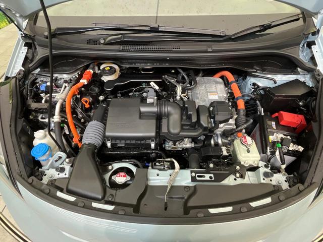 フィット e:HEVホーム 純正9型ナビ バックカメラ ホンダセンシング 禁煙車 ハーフレザーシート コーナーセンサー スマートキー LEDヘッド ETC2.0 車線逸脱警報 オートライト オートエアコン 電動格納ミラー(18枚目)