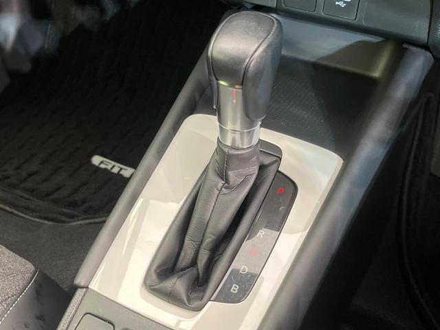フィット e:HEVホーム 純正9型ナビ バックカメラ ホンダセンシング 禁煙車 ハーフレザーシート コーナーセンサー スマートキー LEDヘッド ETC2.0 車線逸脱警報 オートライト オートエアコン 電動格納ミラー(24枚目)