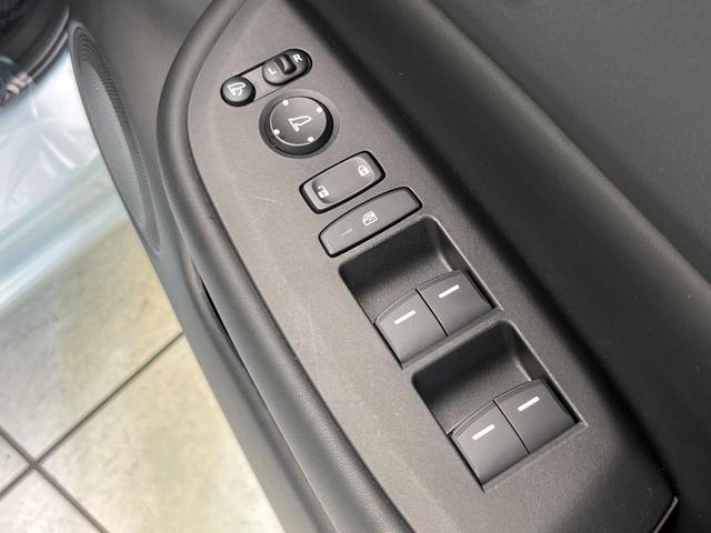 フィット e:HEVホーム 純正9型ナビ バックカメラ ホンダセンシング 禁煙車 ハーフレザーシート コーナーセンサー スマートキー LEDヘッド ETC2.0 車線逸脱警報 オートライト オートエアコン 電動格納ミラー(41枚目)