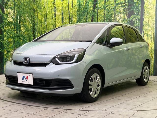 フィット e:HEVホーム 純正9型ナビ バックカメラ ホンダセンシング 禁煙車 ハーフレザーシート コーナーセンサー スマートキー LEDヘッド ETC2.0 車線逸脱警報 オートライト オートエアコン 電動格納ミラー(51枚目)