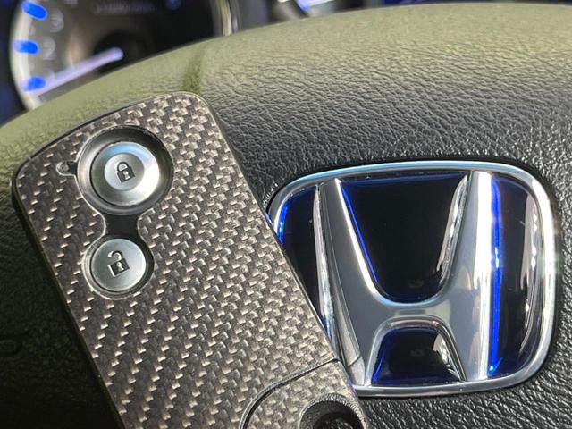 フィットハイブリッド RS 純正ナビ バックカメラ 禁煙車 HIDヘッド ETC クルーズコントロール Bluetooth再生 オートエアコン オートライト スマートキー 純正16インチAW 地デジ CD/DVD 電動格納ミラー(7枚目)