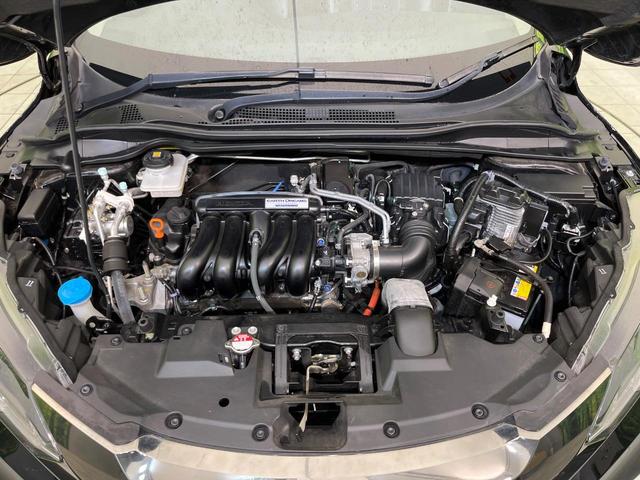 ヴェゼル ハイブリッドＺ・ホンダセンシング　純正ナビ　バックカメラ　ホンダセンシング　レーダークルーズ　禁煙車　ハーフレザーシート　コーナーセンサー　ＬＥＤヘッド＆フォグ　ＥＴＣ　ドラレコ　オートエアコン　オートライト　スマートキー（18枚目）