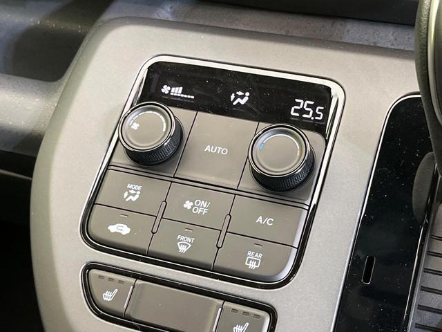 フリード ｅ：ＨＥＶクロスター　登録済未使用車　ホンダセンシング　アダプティブクルーズ　前席シートヒーター　クリアランスソナー　オートエアコン　オートライト　スマートキー　純正１６インチＡＷ　電動格納ミラー　プライバシーガラス（7枚目）