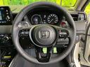 ｅ：ＨＥＶ　Ｚ　登録済未使用車　純正９型ナビ　バックカメラ　ホンダセンシング　禁煙車　ＥＴＣ　Ｂｌｕｅｔｏｏｔｈ接続　シートヒーター　パワーバックドア　ハーフレザーシート　ＬＥＤヘッドライト　置くだけ充電（11枚目）