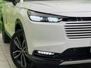 ｅ：ＨＥＶ　Ｚ　登録済未使用車　純正９型ナビ　バックカメラ　ホンダセンシング　禁煙車　ＥＴＣ　Ｂｌｕｅｔｏｏｔｈ接続　シートヒーター　パワーバックドア　ハーフレザーシート　ＬＥＤヘッドライト　置くだけ充電（12枚目）