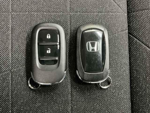 ヴェゼル ｅ：ＨＥＶＸ　ホンダ認定中古車　純正ドラレコ前後　前後障害物センサー　ＡＡＣ　１オーナ　イモビライザー　スマ－トキ－　誤発進抑制　ＰＷ　リアカメラ　クルコン　ＥＳＣ　ＥＴＣ装備　キーフリー　ＬＥＤヘッドランプ　ＰＳ（18枚目）
