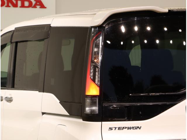 ステップワゴンスパーダ スパーダ 横滑り防止 スマキー ナビ&TV Bモニター サイドエアバック キーレス ECON オートクルーズ LEDライト 盗難防止 Wエアバッグ DVD PS 3列シート ABS ETC タ-ボ(19枚目)