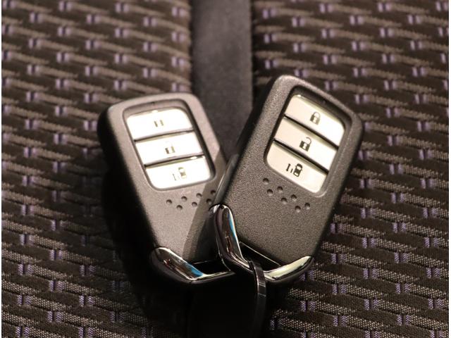 ステップワゴンスパーダ スパーダ 横滑り防止 スマキー ナビ&TV Bモニター サイドエアバック キーレス ECON オートクルーズ LEDライト 盗難防止 Wエアバッグ DVD PS 3列シート ABS ETC タ-ボ(29枚目)