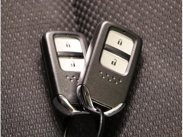 ヴェゼル ハイブリッドX クリソナ リヤカメラ ETC付き Aクルーズ セキュリティアラーム VSA アイドリングSTOP ナビTV スマートキ USB接続 サイドエアバッグ DVD再生機能 LEDライト PS(28枚目)