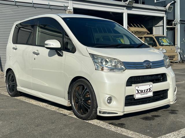 ムーヴ カスタム　ＲＳ　フル装備　社外アルミ　ローダウン　社外ナビ　ＭＯＭＯステアリング　ＥＴＣ　キーレス　ナビ　ベンチシート　フルフラット（3枚目）