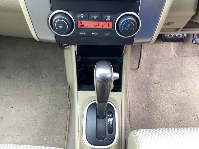 ティーダ １５Ｍ　ナビ　スマートキー　電動格納ミラー　ＣＶＴ　盗難防止システム　衝突安全ボディ　ＡＢＳ　エアコン　パワーステアリング　パワーウィンドウ（5枚目）