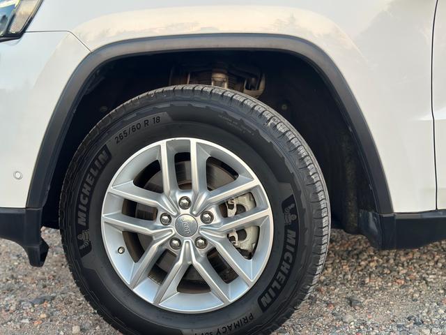 ジープ・グランドチェロキー リミテッド　キー２個　革シート　アルミ　テレビ　電動トランク　クルコン　バックカメラ（48枚目）