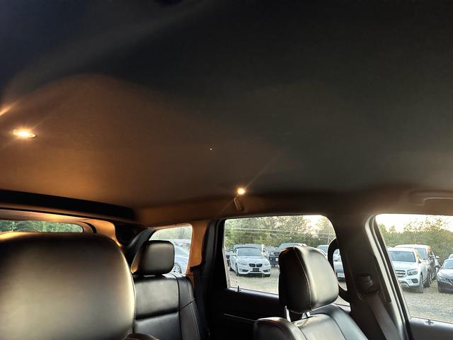 ジープ・グランドチェロキー リミテッド　キー２個　革シート　アルミ　テレビ　電動トランク　クルコン　バックカメラ（69枚目）