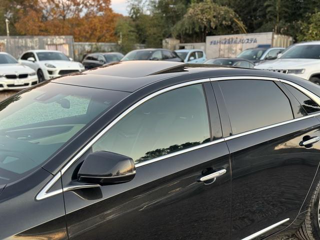 キャデラックＸＴＳ プラチナム　パノラマサンルーフ　左ハンドル　純正ナビ　シートヒーター、クーラー　Ｂｌｕｅｔｏｏｔｈ付　オートクルーズコントロール（34枚目）