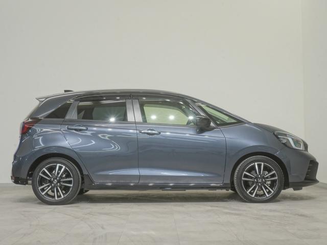 フィット ｅ：ＨＥＶＲＳ　当社デモカー９インチコネクトディスプレイＬＥＤオートライトオートハイビーム渋滞追従機能付きＡＣＣレーンキープアシストホンダコネクト誤発進抑制機能　エアバッグ　ナビ＆ＴＶ　パワーウィンドウ　ＥＴＣ装備（7枚目）