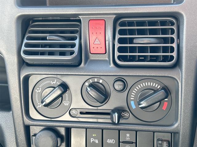 キャリイトラック ＫＣエアコン・パワステ　４ＷＤ　３方開　ＡＴ　クリアランスソナー　アイドリングストップ　オートライト　ＥＳＣ　エアコン　パワーウィンドウ　運転席エアバッグ　助手席エアバッグ（32枚目）