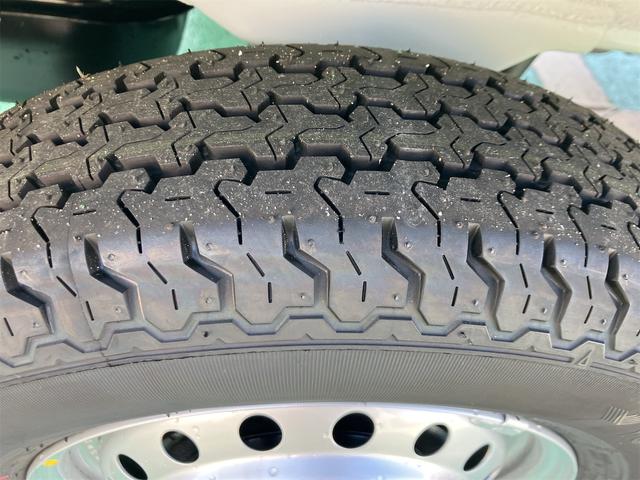 スーパーキャリイ 4WD 軽トラック AT 衝突被害軽減システム クリアランスソナー レーンアシスト アイドリングストップ 電動格納ミラー オートライト ESC エアコン パワーウィンドウ 運転席エアバッグ(22枚目)